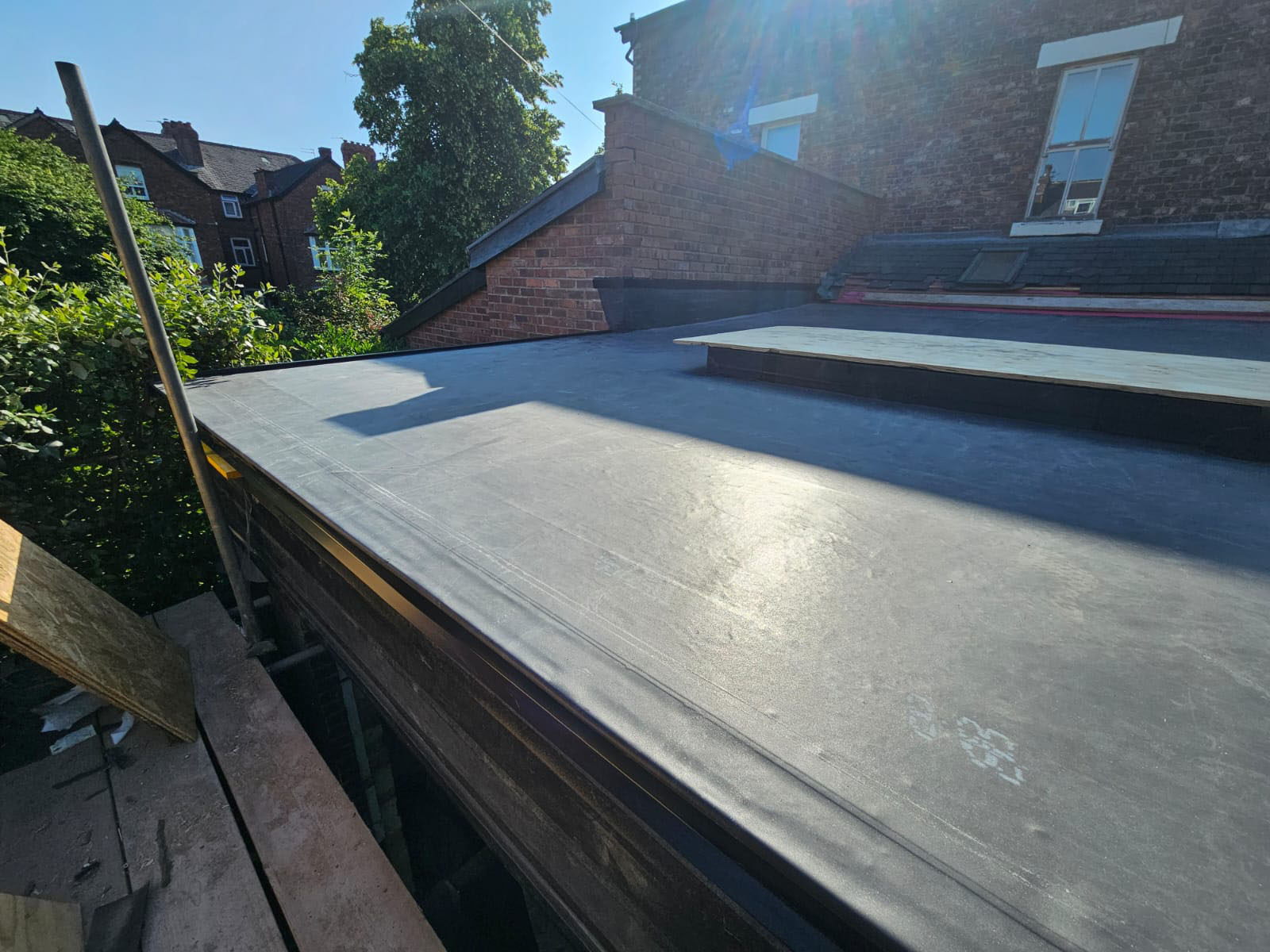 Builders Didsbury. In progress flat roof installation from M20 Builders Ltd.